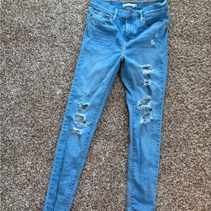 Distressed Levi Blue Jeans